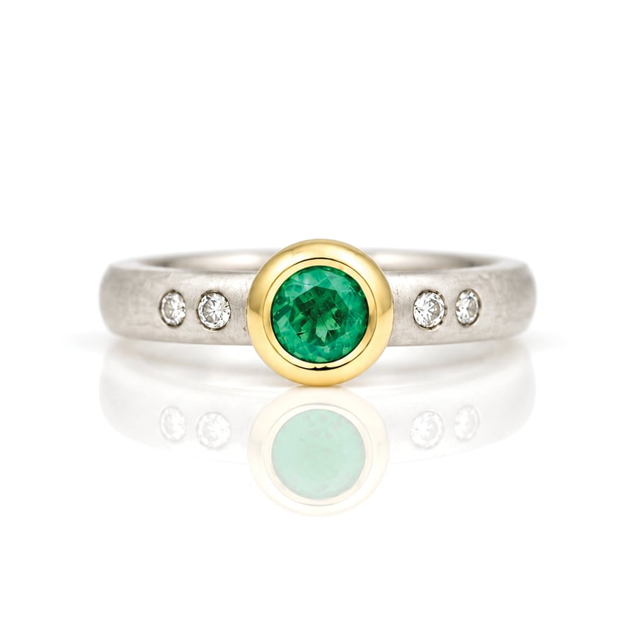 rubover set emerald ring