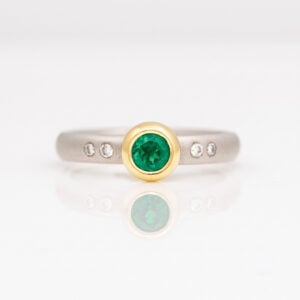 rubover set emerald ring