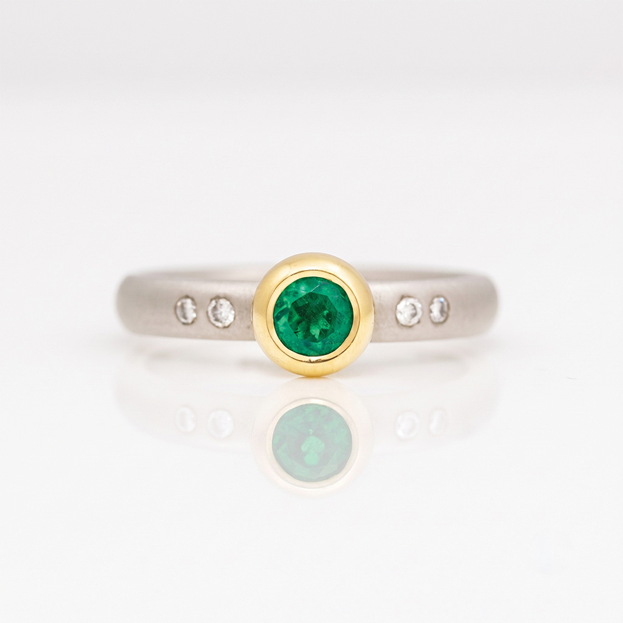 rubover set emerald ring