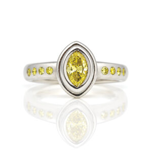 Natural yellow diamond platinum mordern engagement ring easy to wear handmade in London bespoke