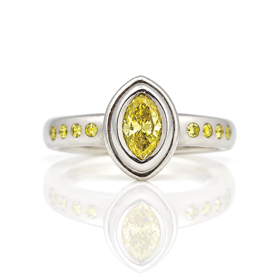 Natural yellow diamond platinum mordern engagement ring easy to wear handmade in London bespoke