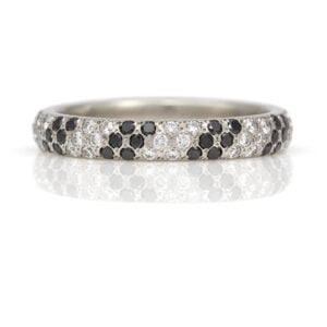Balck and white diamond pave set eternity ring in Platinum