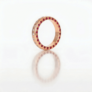 Rubies & diamonds flush set in rose gold ring