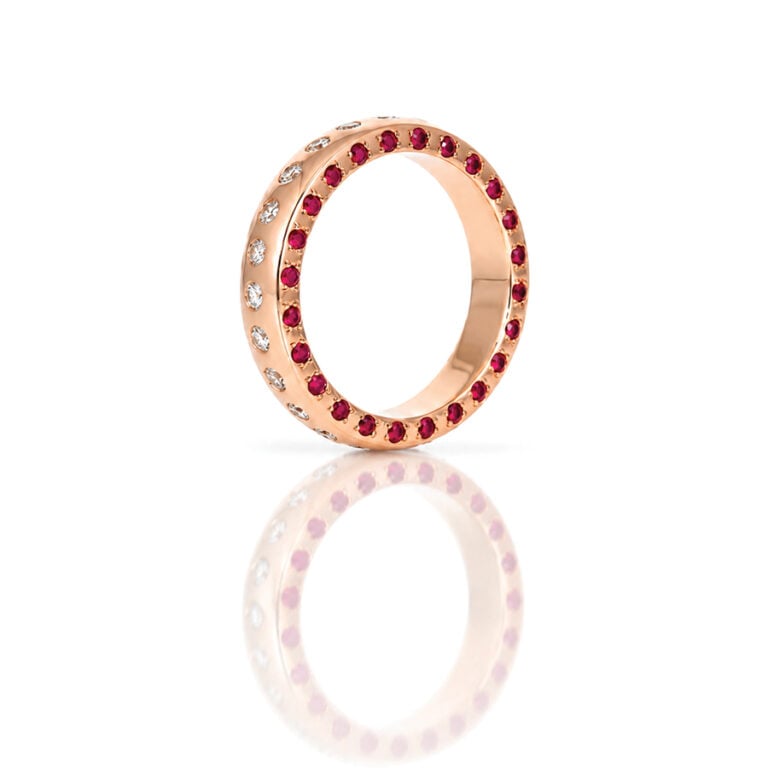 rose gold ring with rubies and diamonds flush set