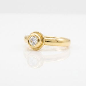 Classic modern rub-over set diamond engagement ring in yellow gold 0698