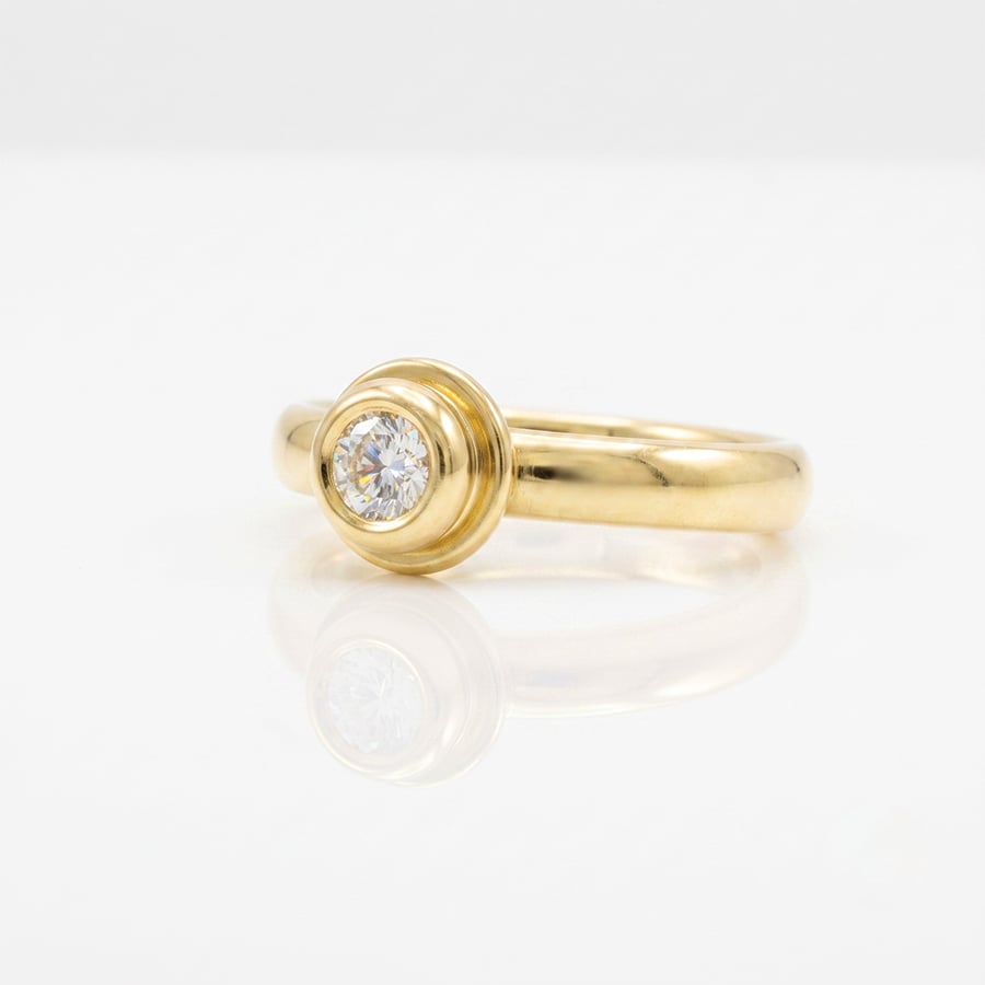 Classic modern rub-over set diamond engagement ring in yellow gold 0698