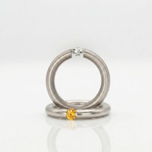 Platinum and natural diamond tension set engagement ring David Ashton 0921 Modern fine jewellery handmade in London bespoke