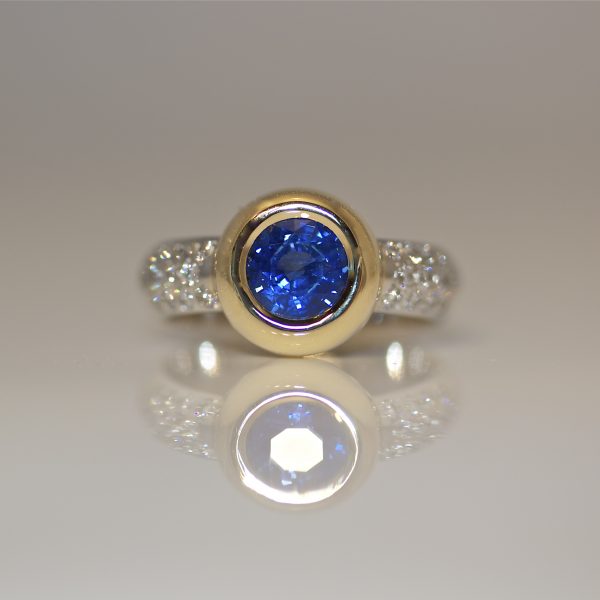 Perfect blue sapphire and diamond engagement ring
