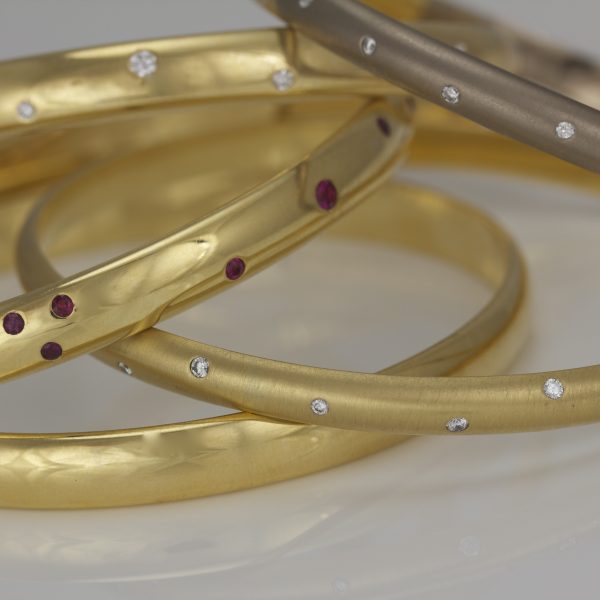 18ct gold solid bangles