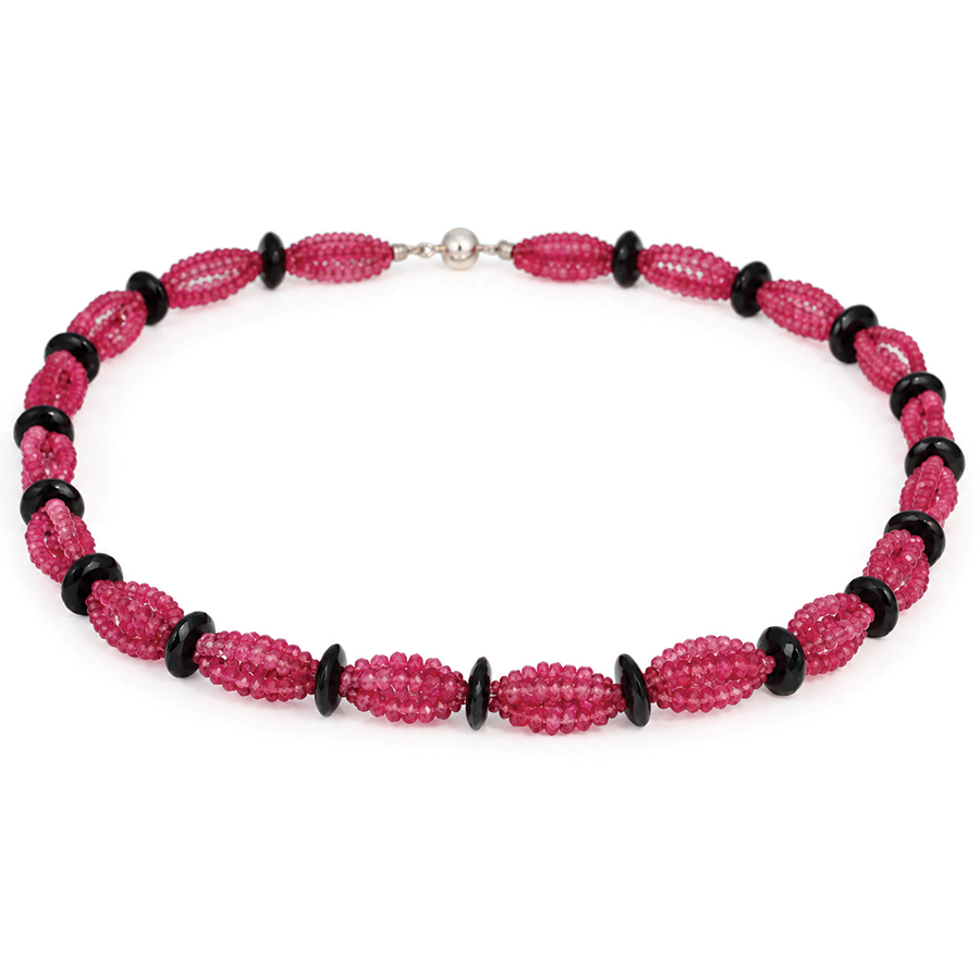 Bunches of vibrant pink tourmaline with black spinel necklace