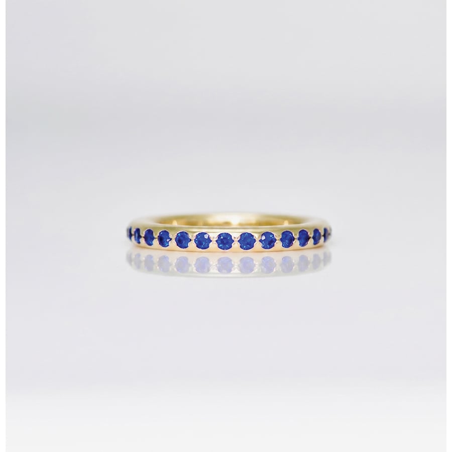 sapphire eternity ring yellow gold