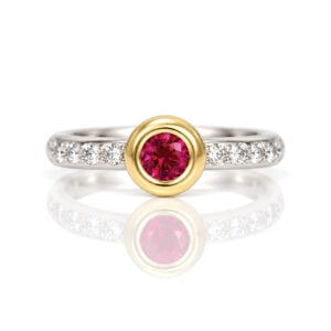 elegant ruby rubover set engagement ring