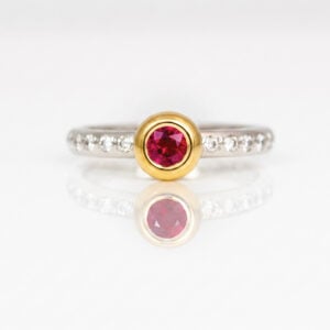 elegant ruby rubover set engagement ring