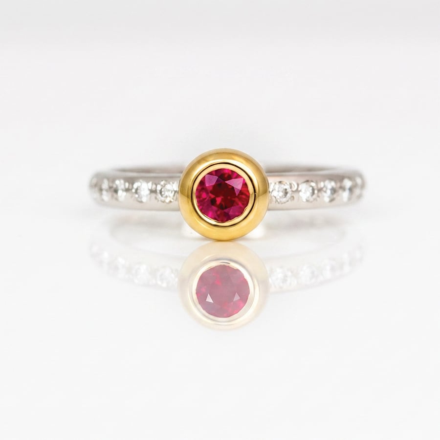 elegant ruby rubover set engagement ring