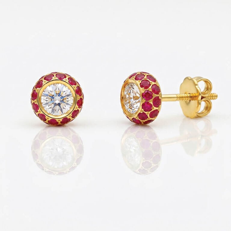 Diamond & Ruby ear-studs in 18ct gold.