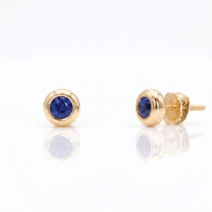 Vibrant blue sapphires set in 18ct yellow gold ear-studs