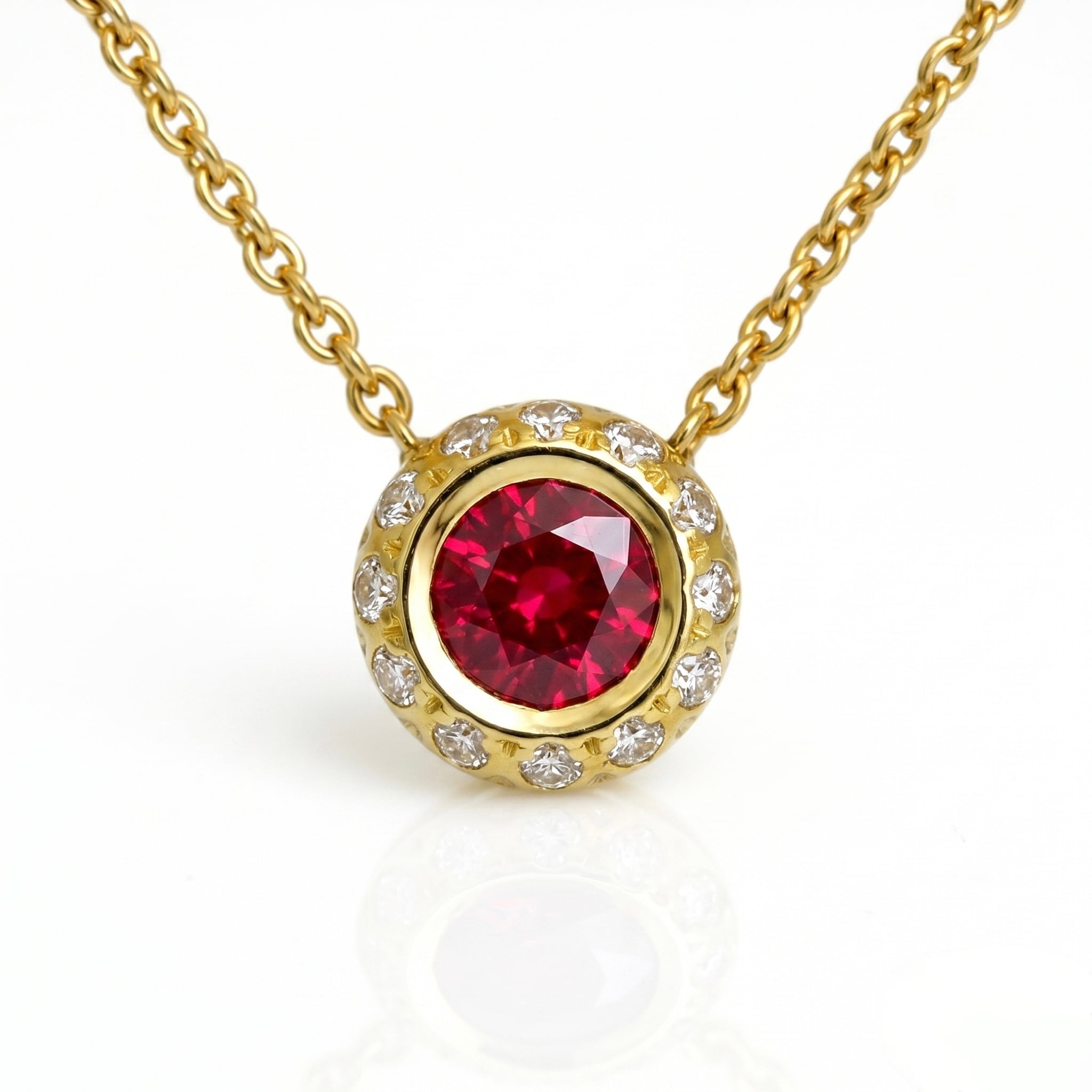 modern ruby necklace with diamond halo