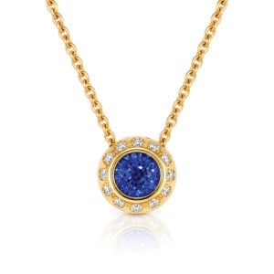Vivid blue sapphire with diamonds 18ct gold modern pendent