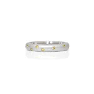 Randomly set yellow diamonds in Platinum ring