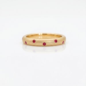 Constellation flush-set rubies in yellow gold