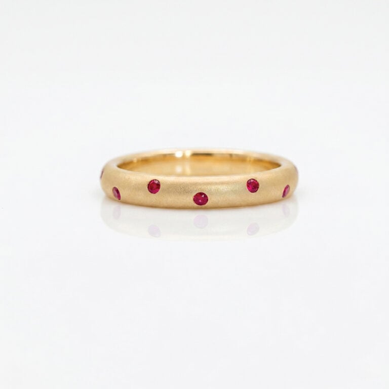 Constellation flush-set rubies in yellow gold