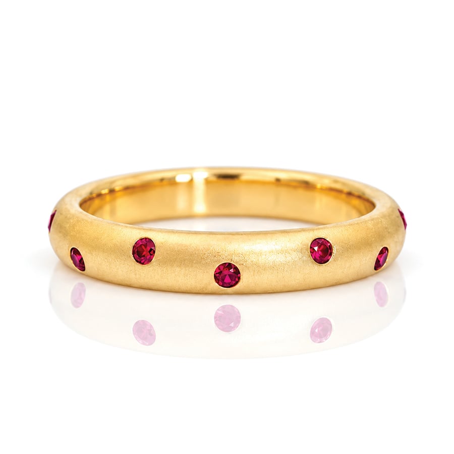 Modern flush set ruby ring