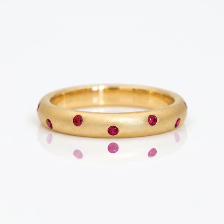 Constellation flush-set rubies in yellow gold