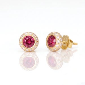 Stunning ruby & diamond halo ear-studs