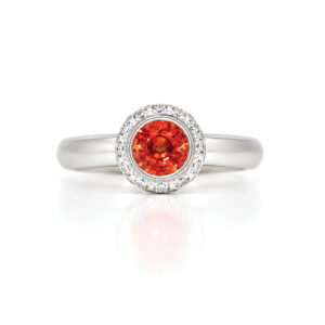 Orange sapphire halo ring
