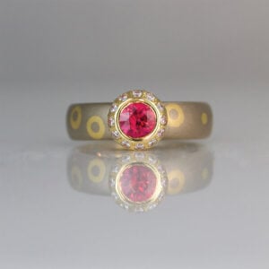 Perfect red ruby framed with diamonds on dot & circle ring