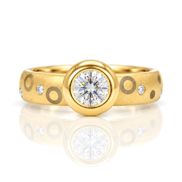 Modern diamond solitaire with chunky gold band