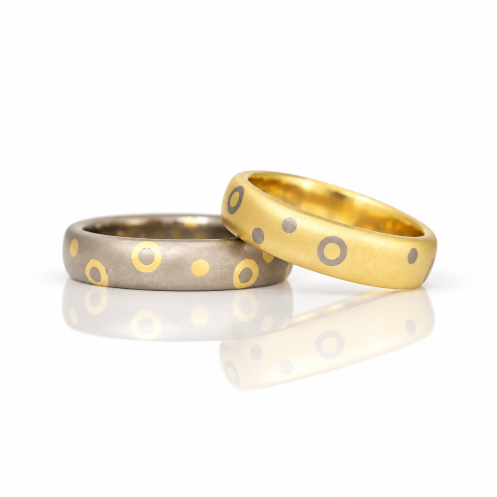 18ct yelow and white gold rings with dots and circles.