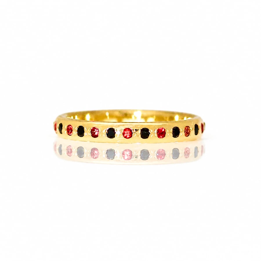 oramge and black stone eternity ring 1072