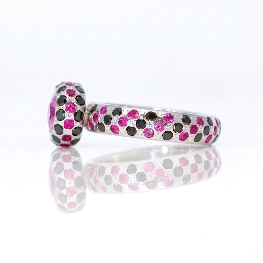 Pink and black diamodn ring side view
