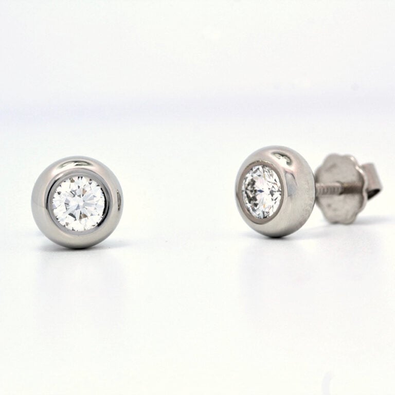 Platinum and diamond ear-studs 0.45ct