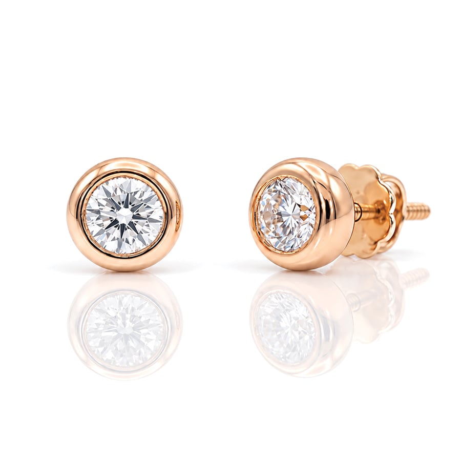 18ct rose gold with diamond ear studs. 8188