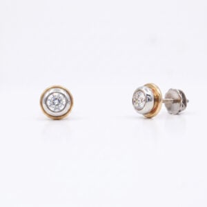 natural diamond earstuds in platinum and yellow gold