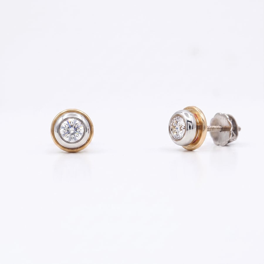 natural diamond earstuds in platinum and yellow gold