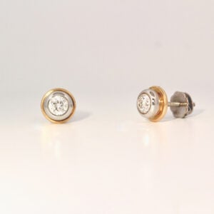 Diamonds set in Platinum with 18ct details earstuds.