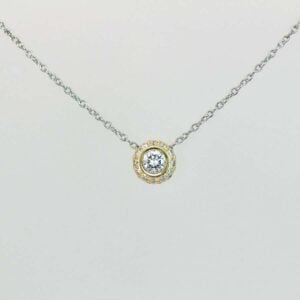 Diamond halo pendant, 18ct yellow gold and Platinum