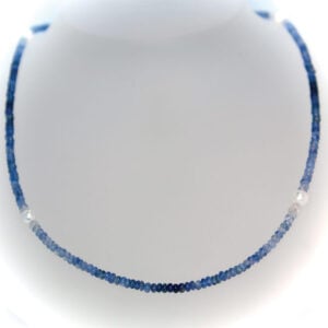 Graduated blue, rondell sapphire necklace with Akoya pearl