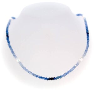 Graduated blue, faceted sapphire necklace with Akoya pearl